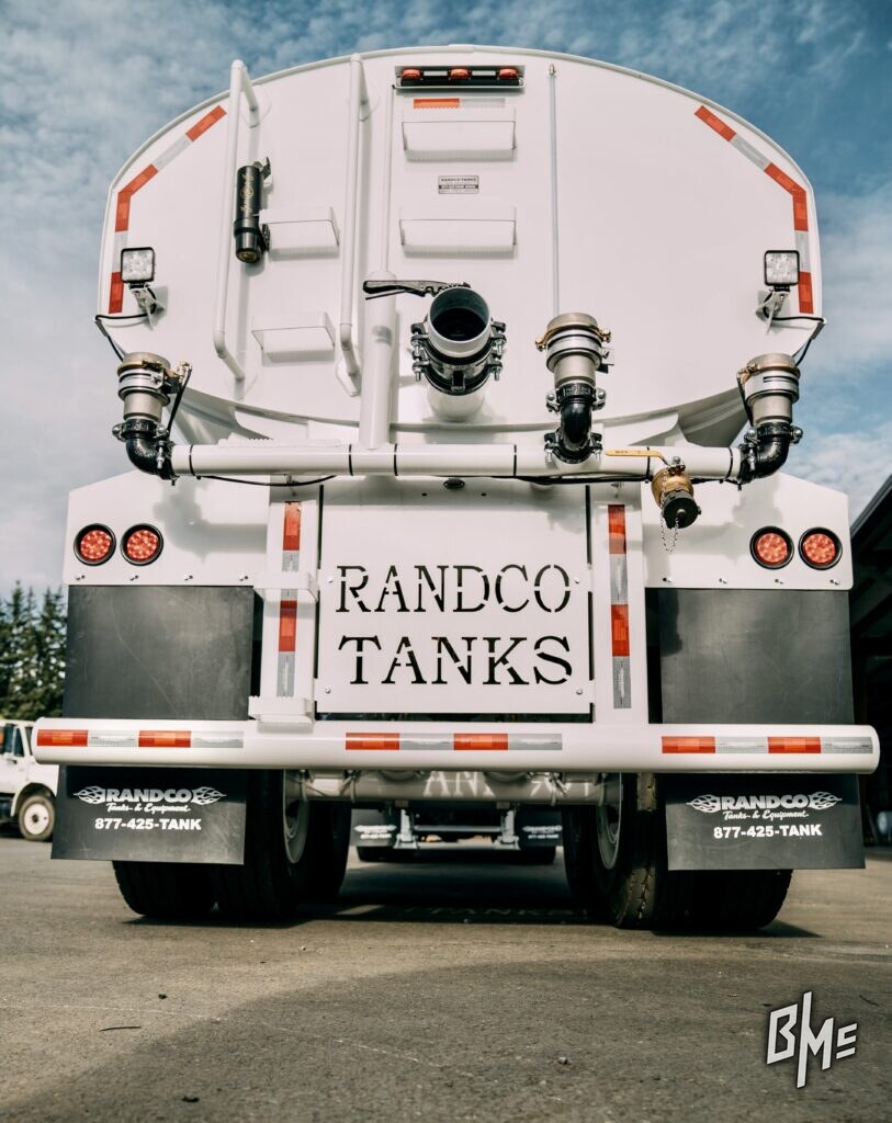 Rear of a finished white water tanker with spray heads either side of the tailgate
