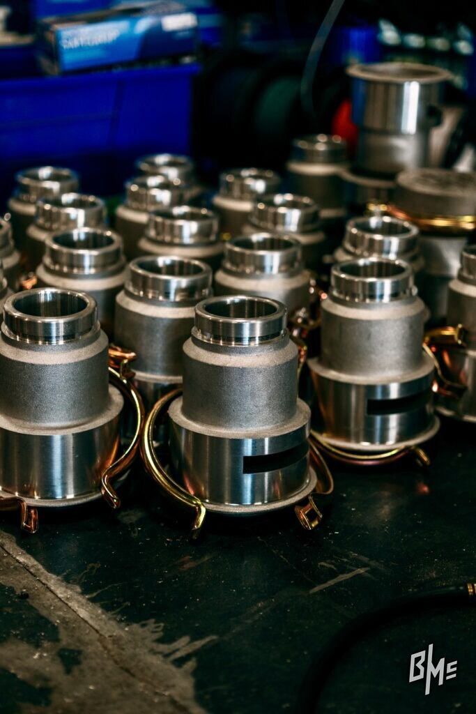 Grooved couplings and clamps grouped on the shop floor