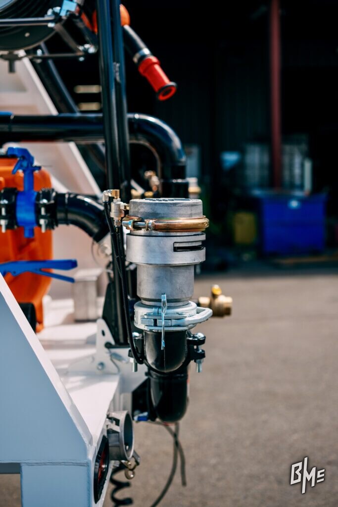 Close view of a spray valve mounted on a water truck