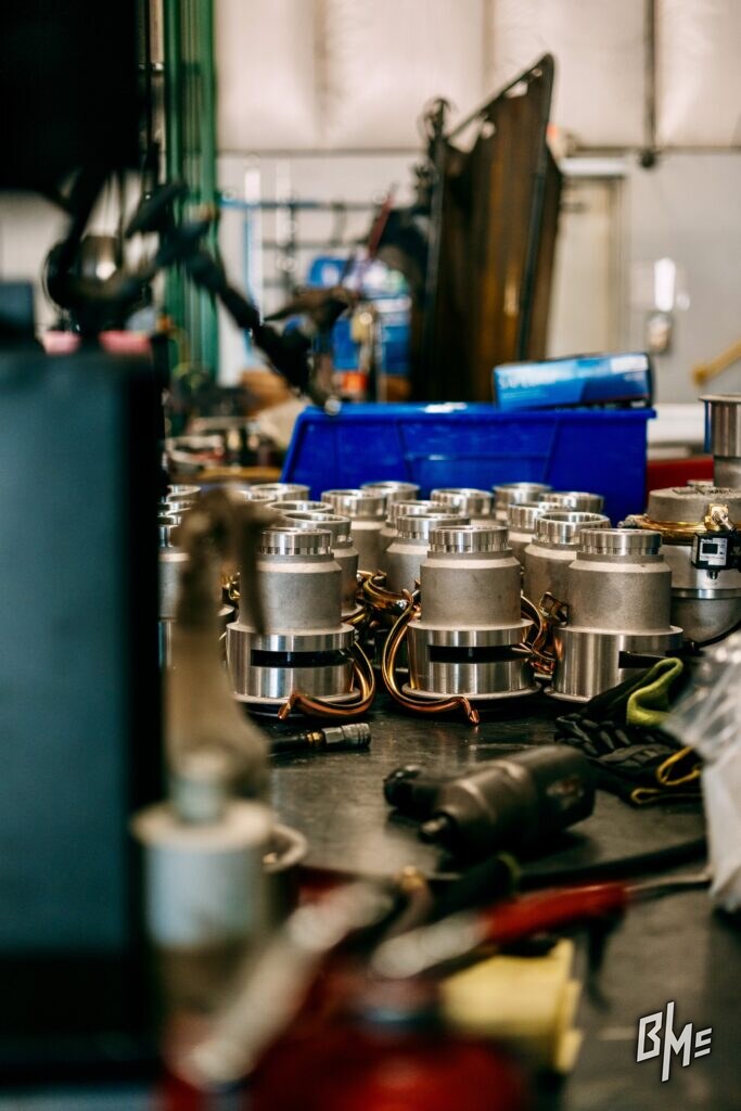Spray valve assembly under way at a shop bench